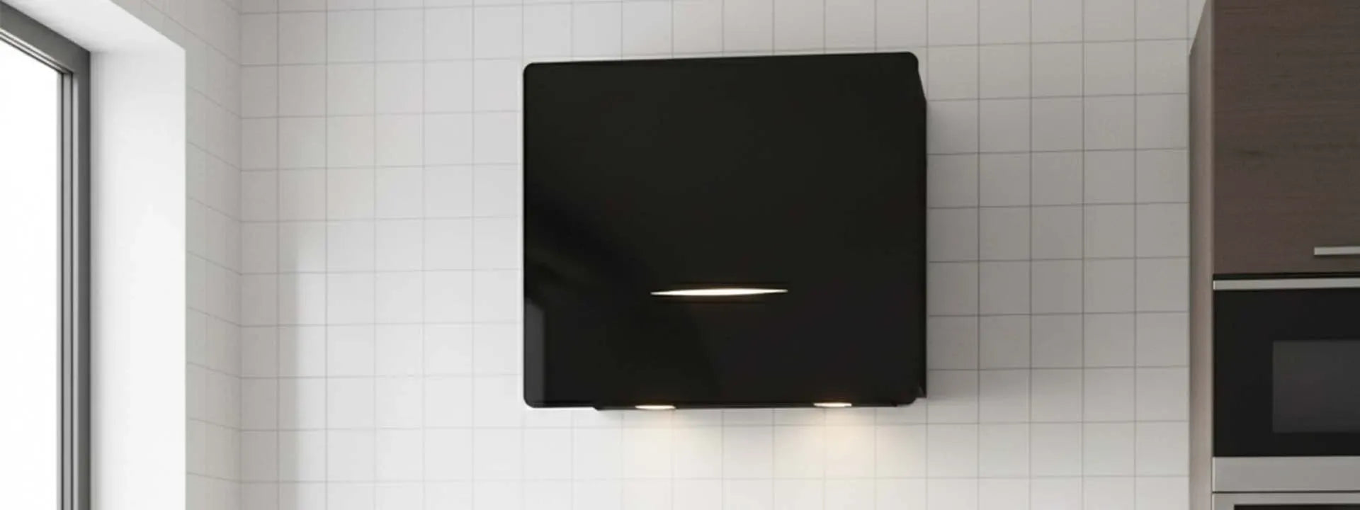 A kitchen with a modern range hood showcasing proper ventilation.