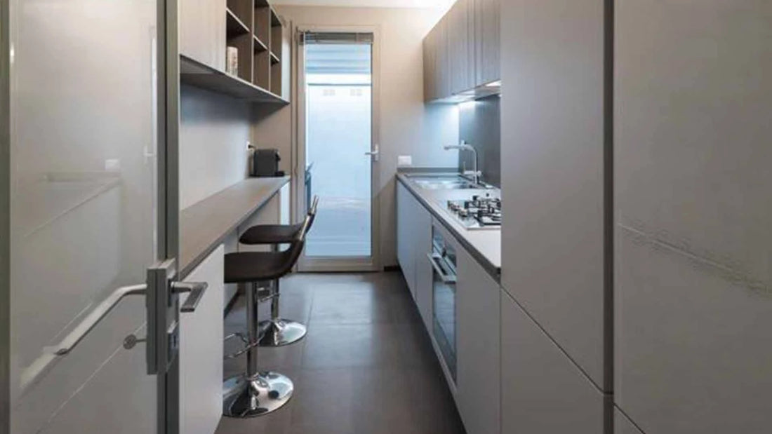A well-organized small kitchen showcasing clever layout inspiration and vertical storage solutions. 